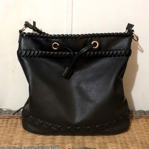 **Moda Luxe** Whip Stitch Hobo Bag. From Free People